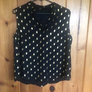 Black sleeveless loose fitting top with gold leaf print